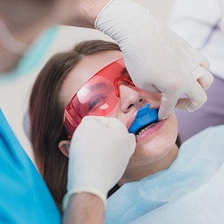 Patient receiving fluoride treatment