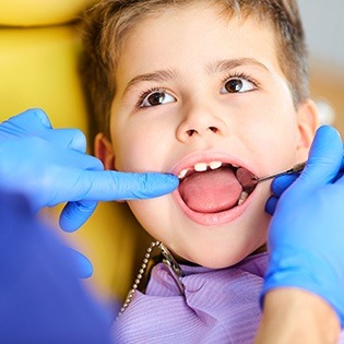 Child receiving dental exam
