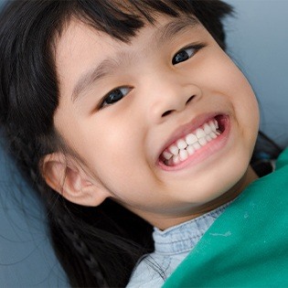 Smiling child in dental chair