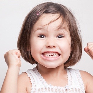 Little girl with missing teeth