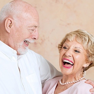 Laughing older man and woman