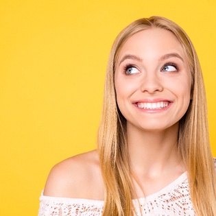 A young woman smiling