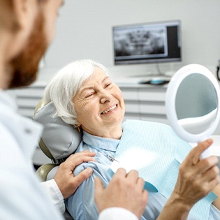 Woman admiring smile in Tappan