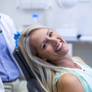 Woman smiling in dental chair