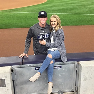 Dr. Haddad with her husband at Yankee stadium
