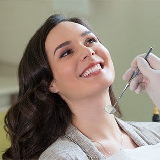 Smiling woman in dental chair