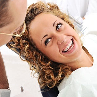 Smiling woman in dental chair