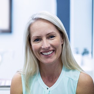 Patient smiling after sedation dentistry in Tappan