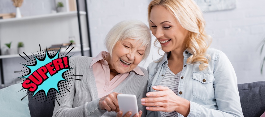 woman and mother smiling while researching the Referral Program in Tappan