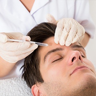 Man receiving BOTOX injections