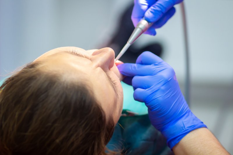 a patient under sedation while receiving dental care