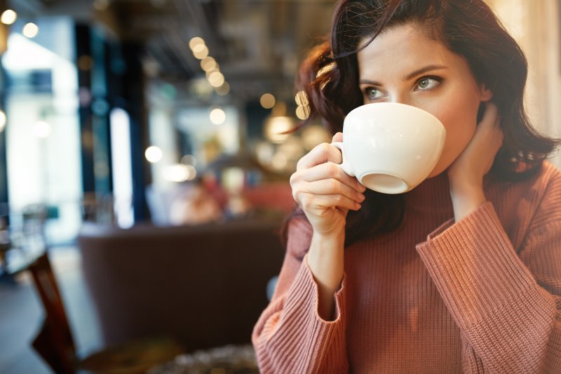 Woman drinking a cup of coffee