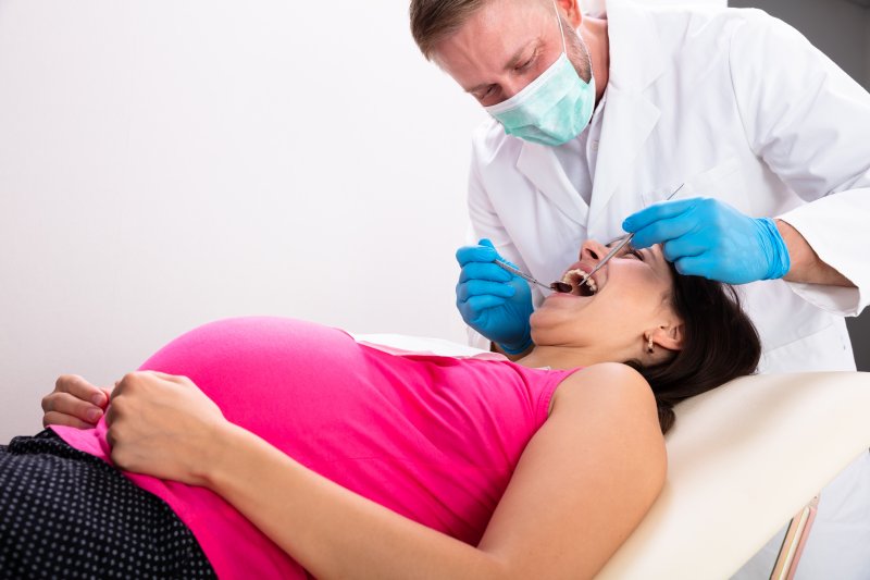 pregnant woman undergoing dental checkup in Tappan