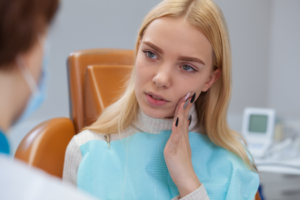 a patient visiting their dentist for urgent care